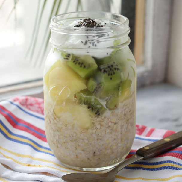 tropical overnight oats topped with low-fat yogurt and chia seeds